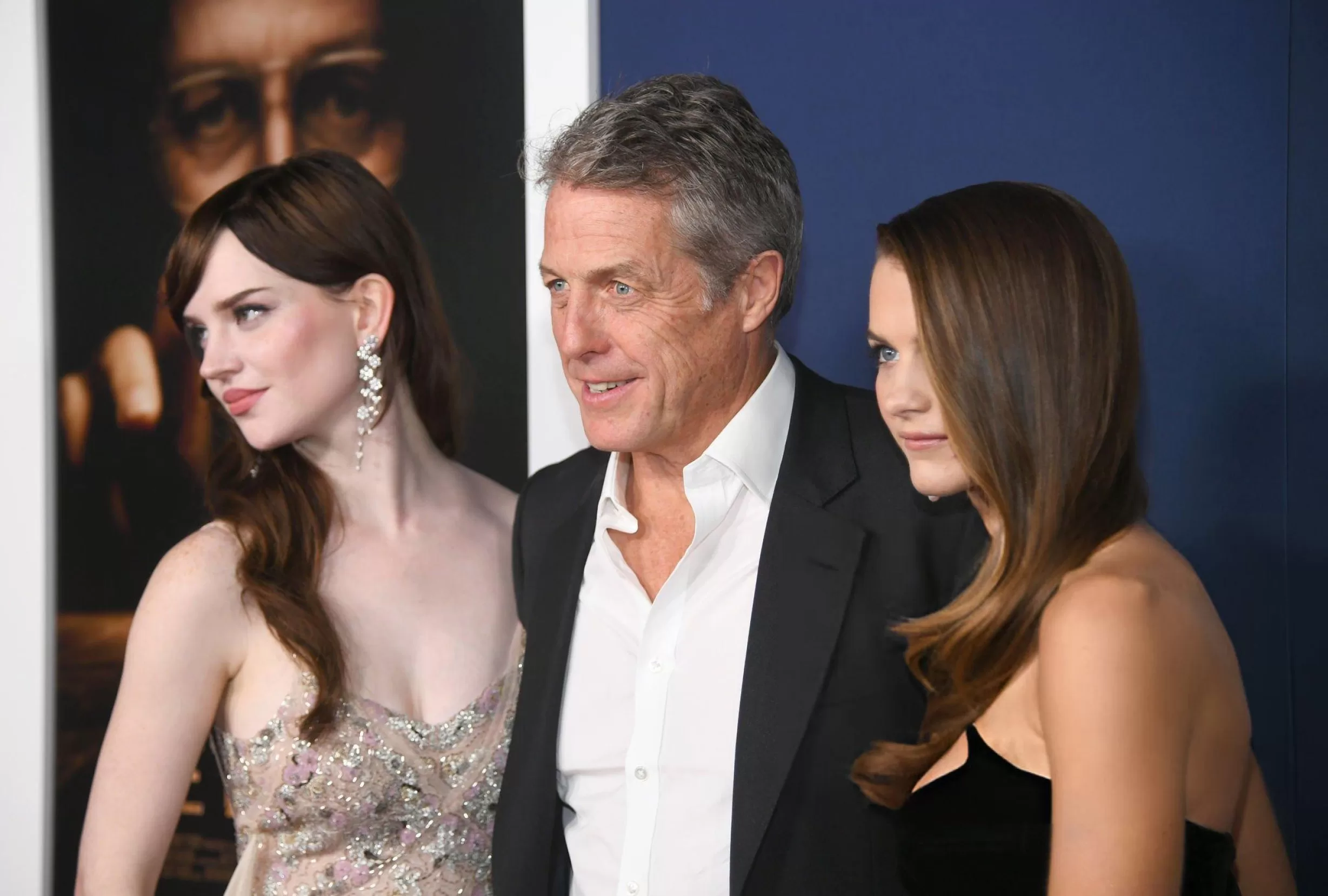 Hugh grant with costars on premiere of Heretic film